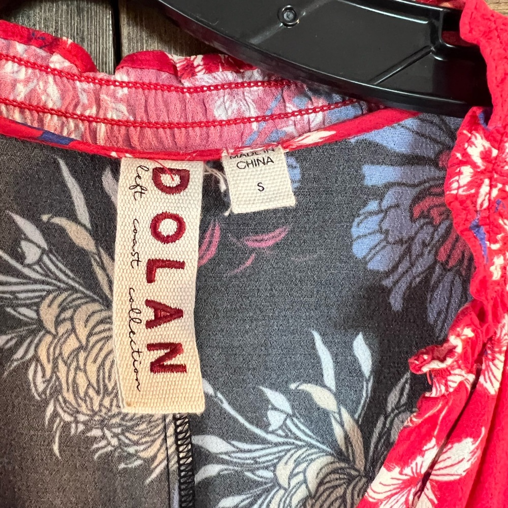 From Anthropologie. Beautiful Dolan collection top in red and black flowers.